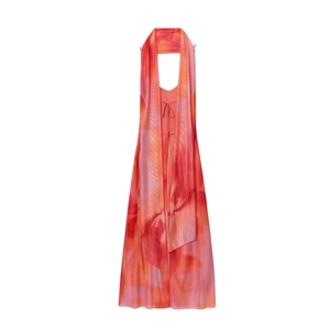 Détail d'une robe maxi dos nu avec imprimé floral dégradé rose et orange soyeux