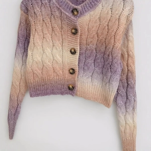 Chic cable knit gradient cardigan in purple and orange with marble buttons