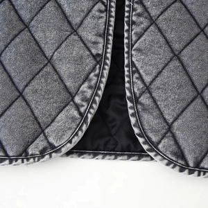 Washed dark gray denim quilted jacket with diamond stitch pattern and vintage casual style