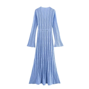 Elegant light blue long sleeve crochet knit maxi dress with openwork details and flared cuffs