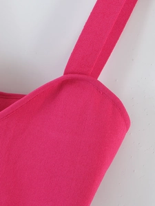 Close-up of pink knitted top strap showing fine stitching and durable fabric texture