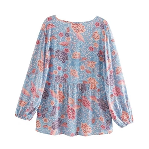 Back view of bohemian floral print long sleeve shirt in light blue with lantern sleeves
