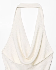 Detail of cowl neck halter top featuring a 3D waffle honeycomb texture fabric in off-white