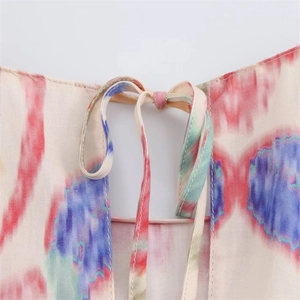 Detailed view of the drawstring neckline on the printed floral spring two-piece set