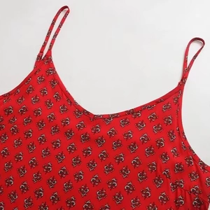 Women's V-neck red floral tank top with adjustable spaghetti straps in casual summer style