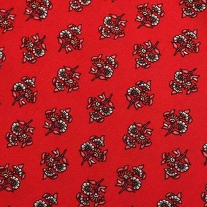 Red floral print rayon camisole dress with white and dark red flower patterns