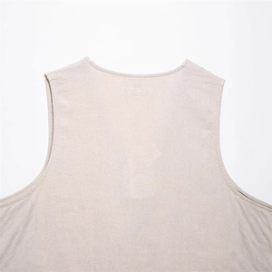 Linen blend sleeveless top in light oatmeal color with detailed round neckline embroidery