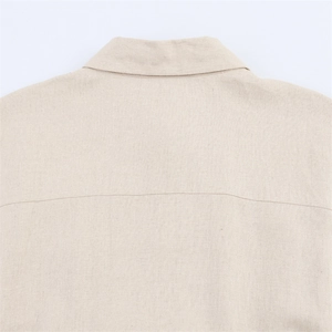 Longue robe en lin beige élégante avec texture naturelle et coupe ajustée pour femme