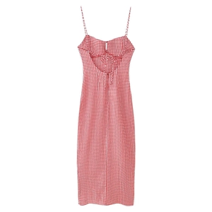 Red gingham sundress with spaghetti straps and open back tie detail on white background