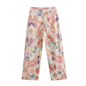Bohemian floral wide leg trousers with colorful abstract print on cream background