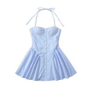Detail of light blue striped halter dress with sweetheart neckline and white buttons