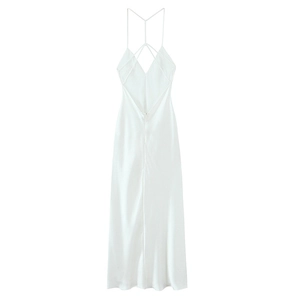 Detail view of the elegant criss-cross back straps and silky satin fabric on the white dress