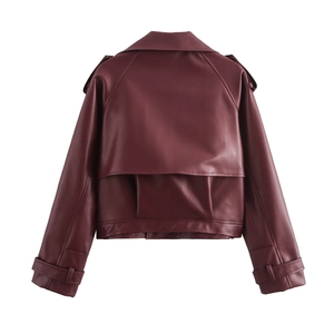 Detail view of the burgundy faux leather biker jacket back with storm flap and shoulder tabs
