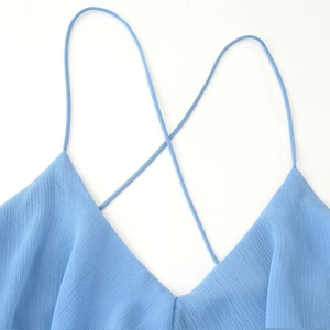 Sky blue spaghetti strap dress with crisscross V-neckline and vertical texture