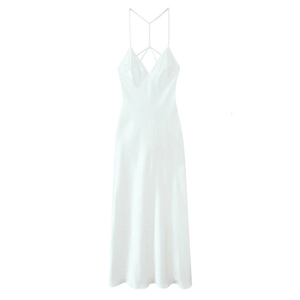 Elegant white satin maxi dress with thin straps and a criss-cross lace-up back design