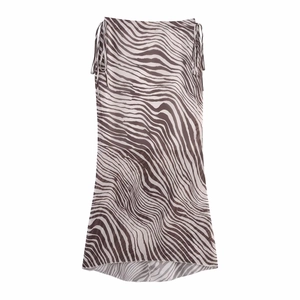 Detail view of zebra print midi skirt featuring side drawstring and mesh fabric details