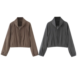 Detailed comparison of brown and dark grey lightweight zip-up windbreaker jackets