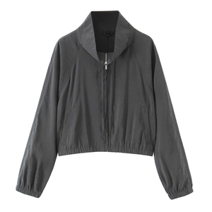 Detail of dark grey lightweight jacket with full zipper, stand collar and elastic cuffs
