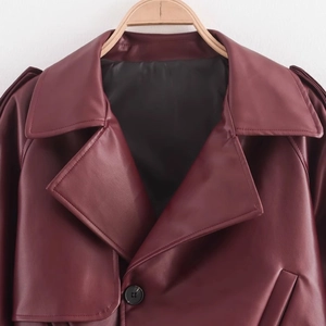 Chic burgundy faux leather long jacket with wide lapels and button closure for women