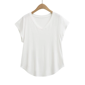 Women's casual loose V-neck short sleeve white t-shirt with curved hem on wooden hanger