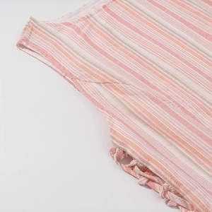 Pink and white vertical striped dress featuring exquisite side woven knot details