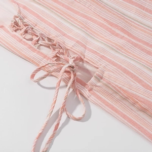 Pink and white striped dress featuring decorative side lace-up drawstring details