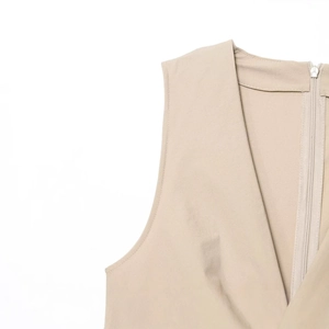 Elegant beige sleeveless dress with a deep V-neckline and a side invisible zipper closure