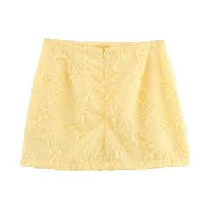 Jupe courte trapèze jaune clair pour femme en tissu texturé à franges avec fermeture