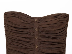 Detailed view of dark brown bandeau top featuring textured pleats and decorative buttons