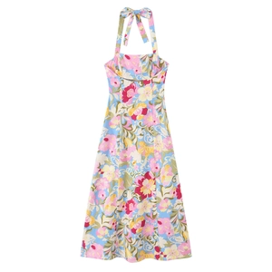 Robe midi dos nu bleu clair avec imprimé floral coloré et nœud élégant à l'arrière