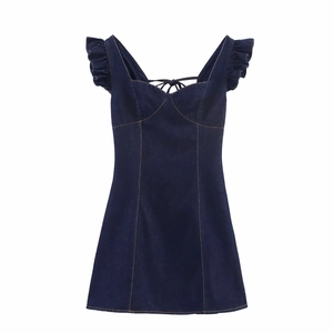 Detail of ruffle sleeve and criss-cross lace-up back on dark blue denim mini dress