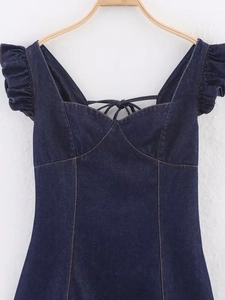Detail of sweetheart neckline with criss-cross lacing on blue denim ruffle mini dress