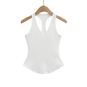Detailed view of white ribbed knit tank top with V-neckline and racerback design