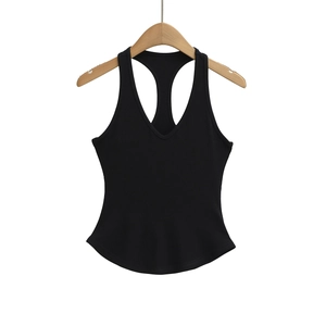 Detail of black ribbed tank top with deep V-neckline and racerback on wooden hanger