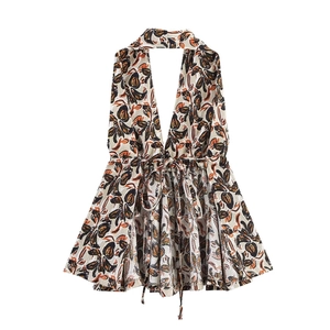 Floral print halter neck jumpsuit with deep V-neck and waist tie in cream and orange