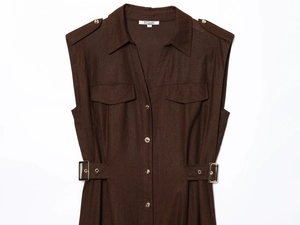 Detail of dark brown linen midi dress featuring chest pockets and shoulder epaulettes