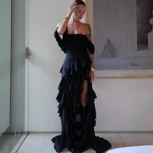 Elegant black off-shoulder maxi dress with tiered ruffle skirt and high slit detail