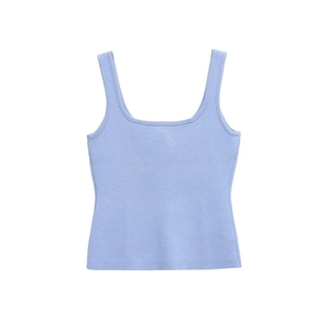 Detailed view of light blue knitted tank top featuring thick straps and square neckline