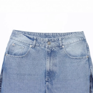 Women's 2025 patchwork denim jeans in light blue wash with stylish metal button detail