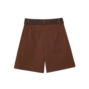 Detailed view of brown high-waisted wool blend shorts with a woven leather belt detail