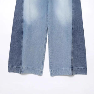 Patchwork design denim jeans with light and dark blue contrasting side panels and hem detail