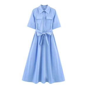 Light blue short sleeve shirt dress with lapel collar, flap pockets and waist tie belt