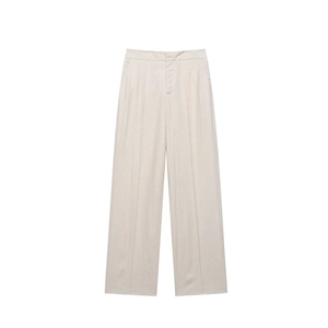 Detail view of high-waist linen blend trousers with front pleats and side pockets