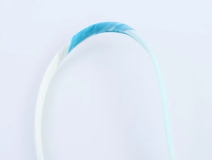 Detailed close-up showing the blue and white marble pattern texture on a slim headband