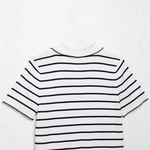 Short sleeve white knit top with black stripes and elegant wavy scalloped edges