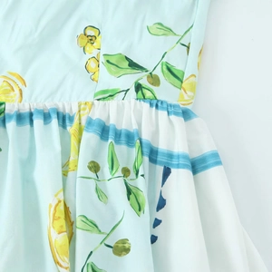 Short sleeve poplin dress with lemon floral print and pleated waist for women