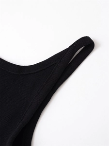 Detail shot of the black ribbed knit fabric and high-quality stitching on the strap