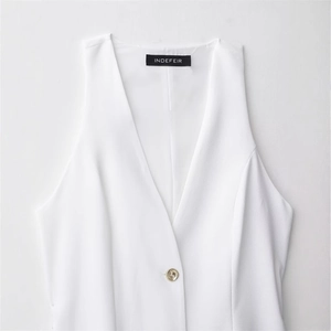 White sleeveless deep V-neck waistcoat with tailored fit and gold button detail