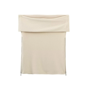 Close-up of beige off-shoulder top with fold-over neckline and side metal zippers