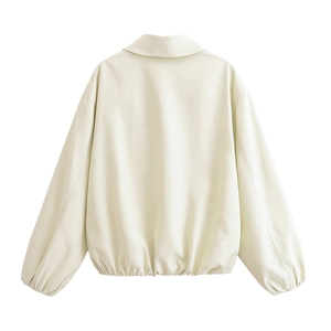 Rear view of cream long sleeve jacket with lapel collar and elastic waist hemline